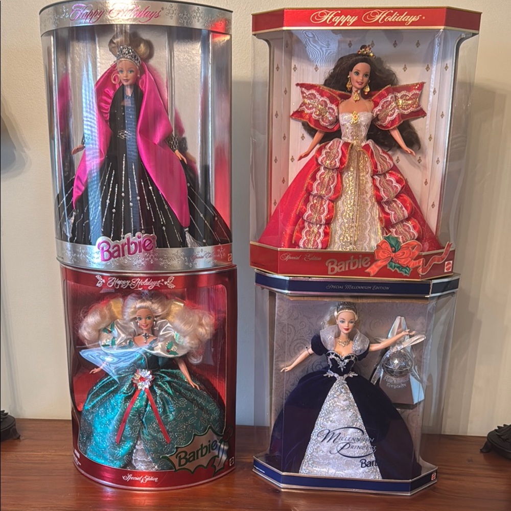 Barbie Holiday Collection Dolls in Pink, Red, Green, and Blue.